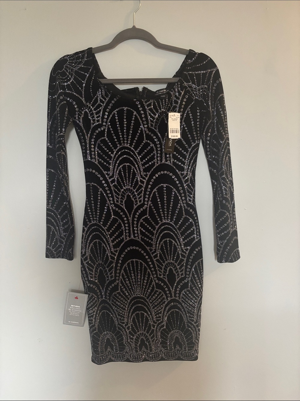 le chateau Black Cocktail Dress with Art Deco-inspired Detail.